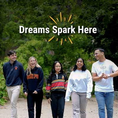 Five University of Guelph students walk together outdoors, smiling and laughing, wearing University of Guelph apparel and casual clothing against a backdrop of green trees. Have they separated out the card image from the banner for stories yet?