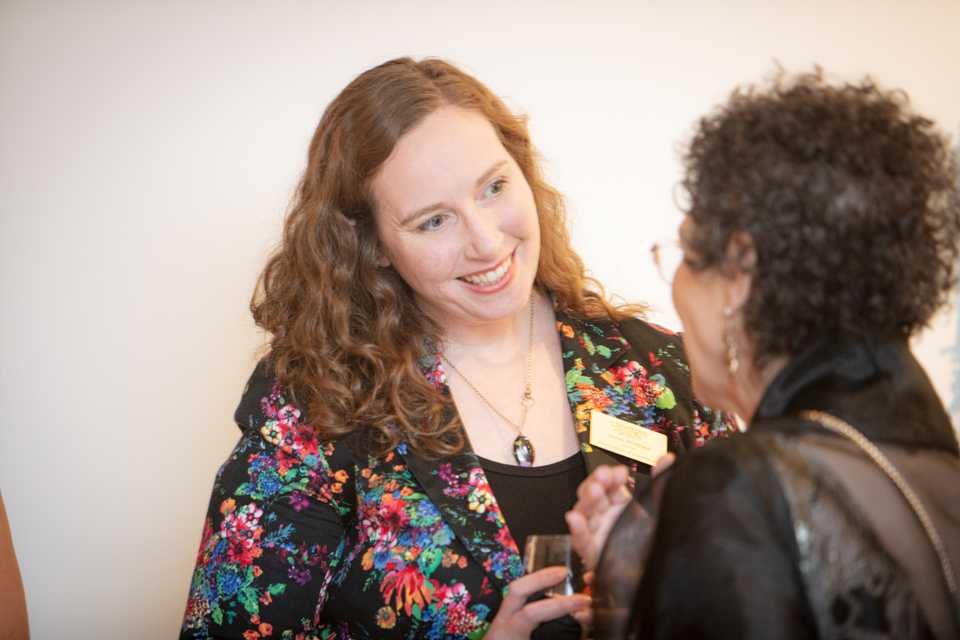 Jayne talking with a donor